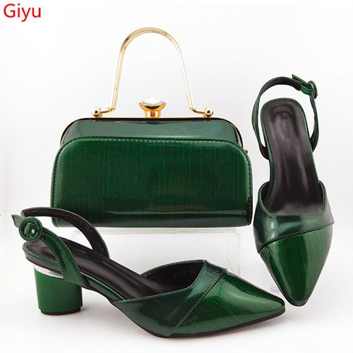 dark green sling bolsa