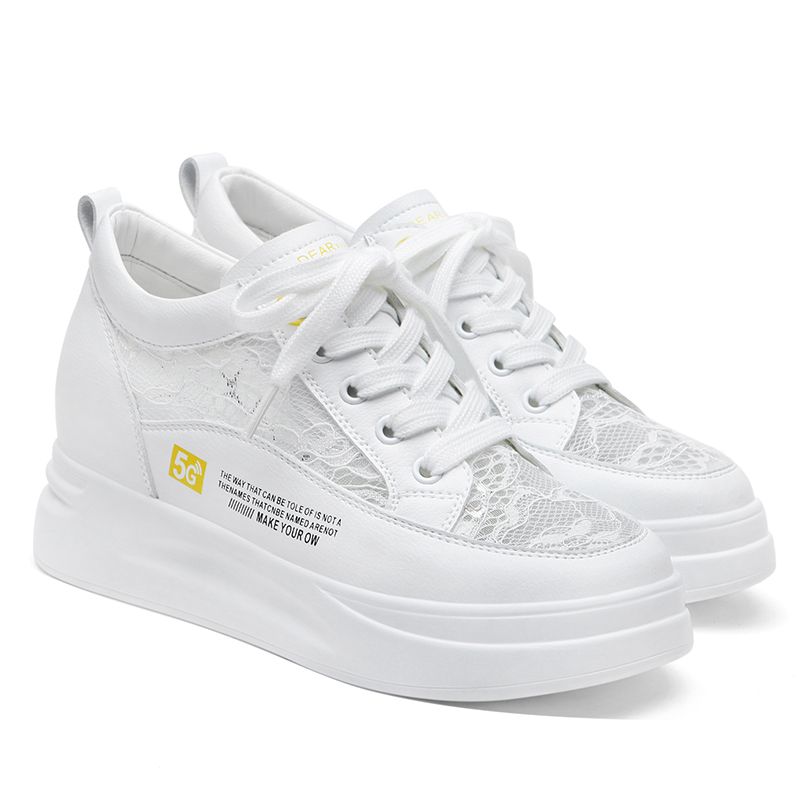 white shoes with black heel