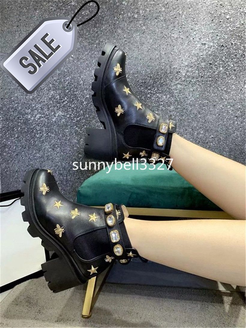embroidered leather ankle boot with belt