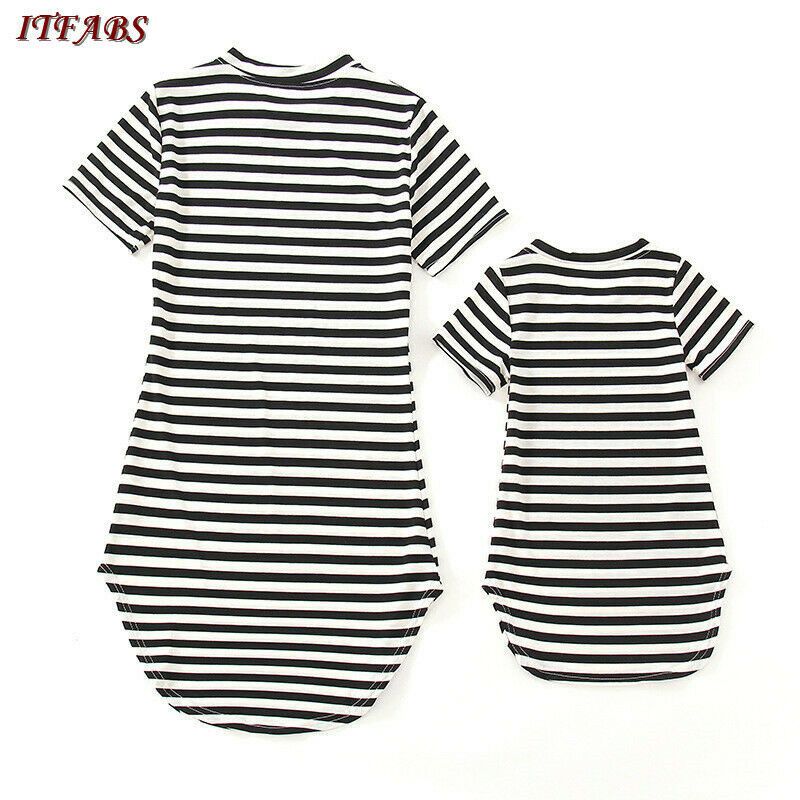 baby girl and mother dress