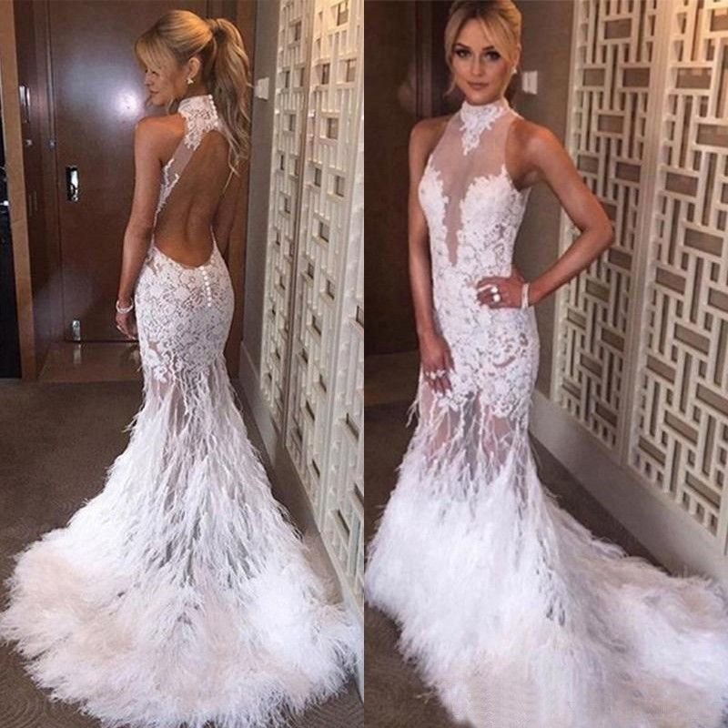 white mermaid prom dress with feathers