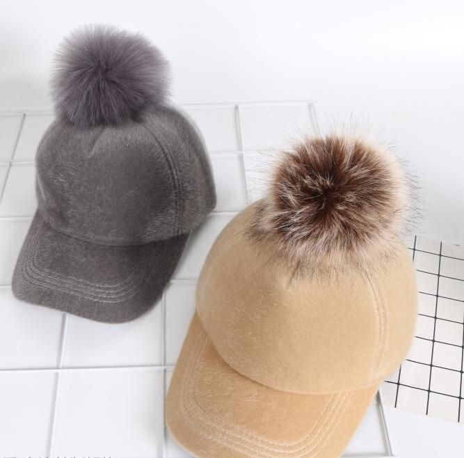 baseball hats with fur ball