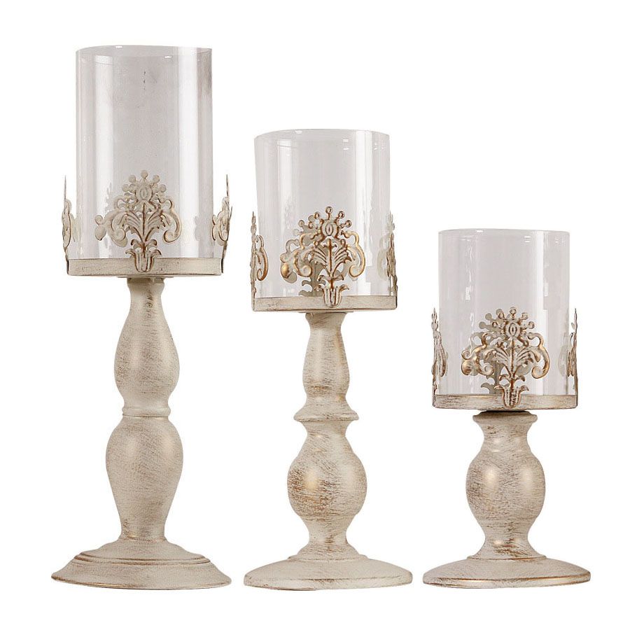 glass and iron candle holders