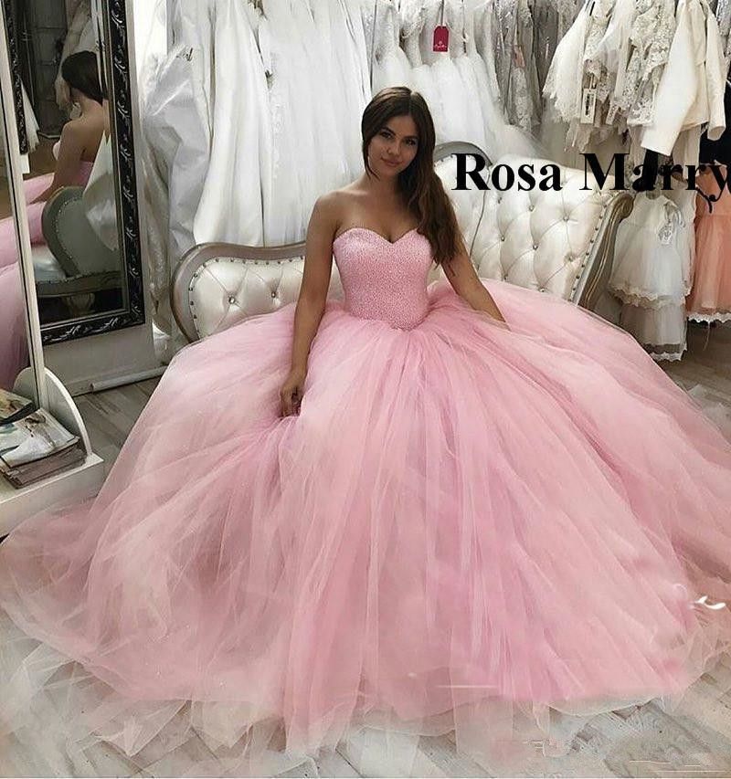 pink puffy quinceanera dresses