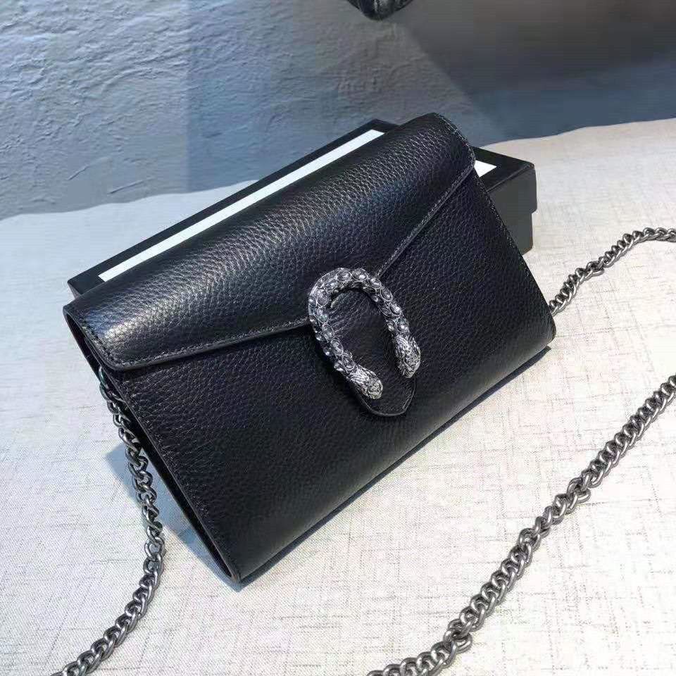small silver bag with chain