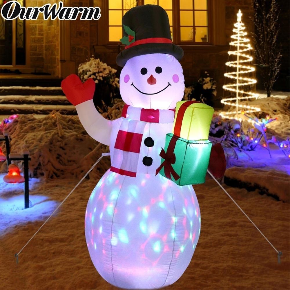 Heasylife Farol de agua con forma de bola de nieve con temporizador de 6 horas Papá Noel, que da regalos en la aldea de la nieve