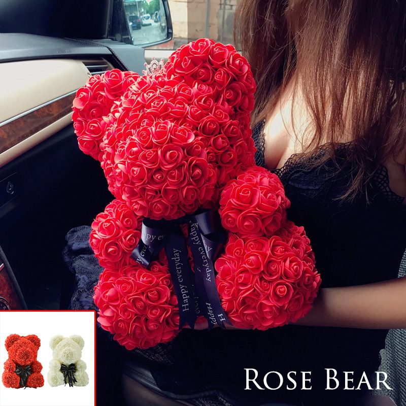 big teddy bear and roses