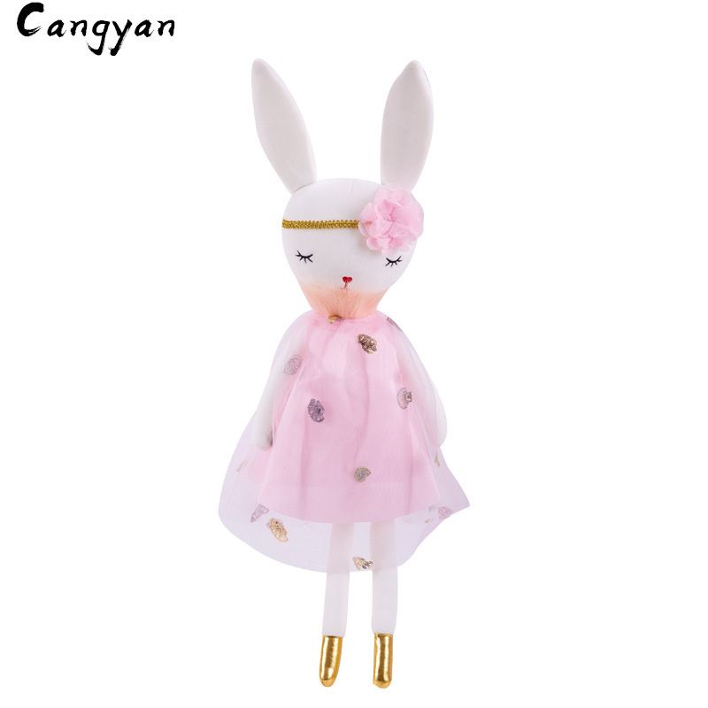 muñeca con orejas de conejo