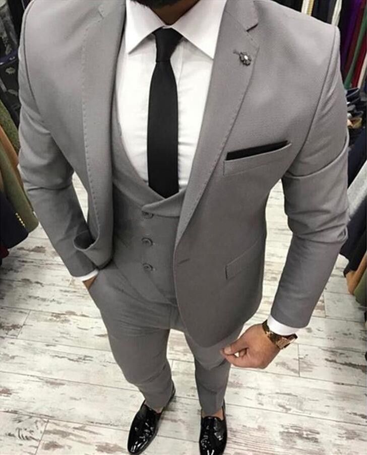 light grey coat pant with black shirt