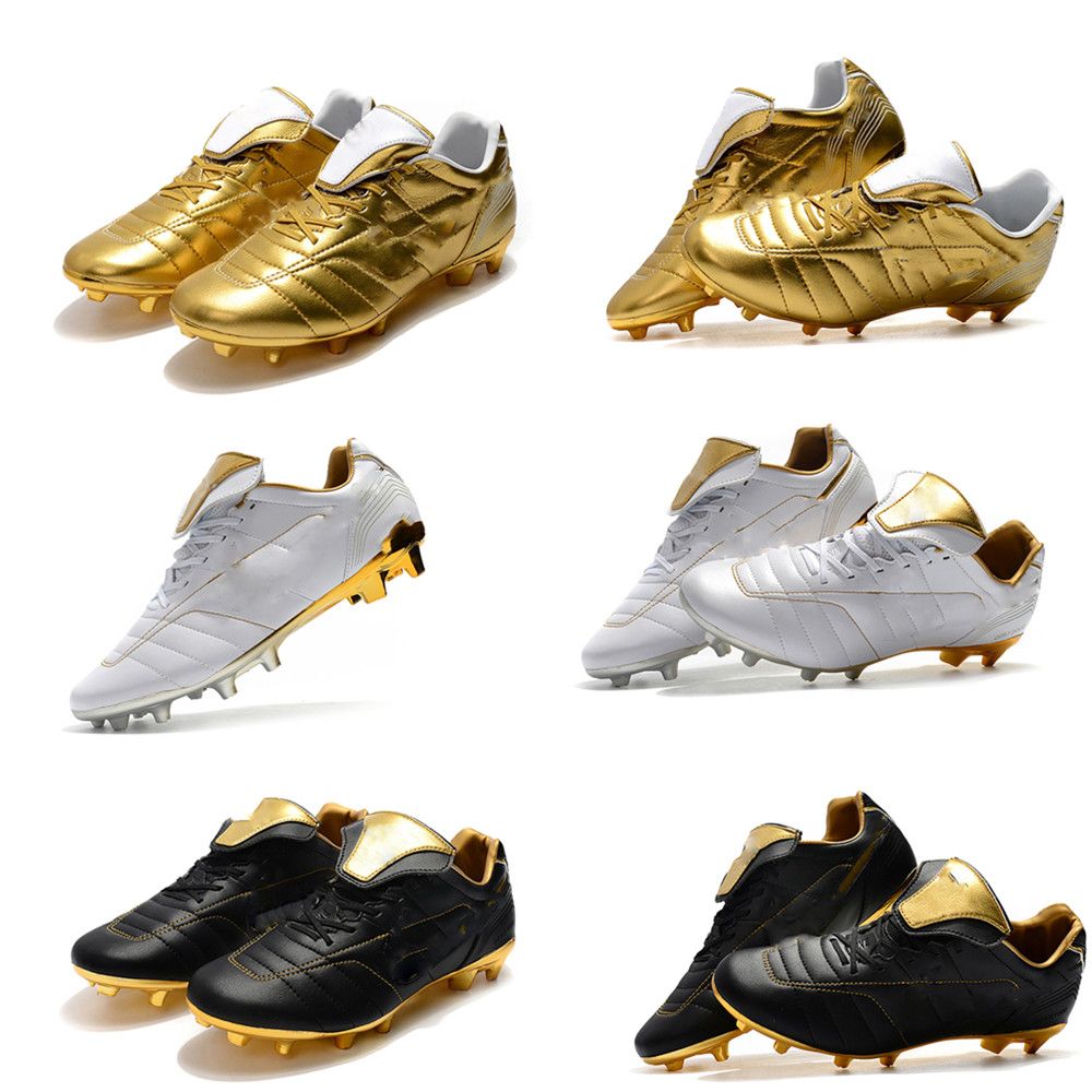 black and gold football boots