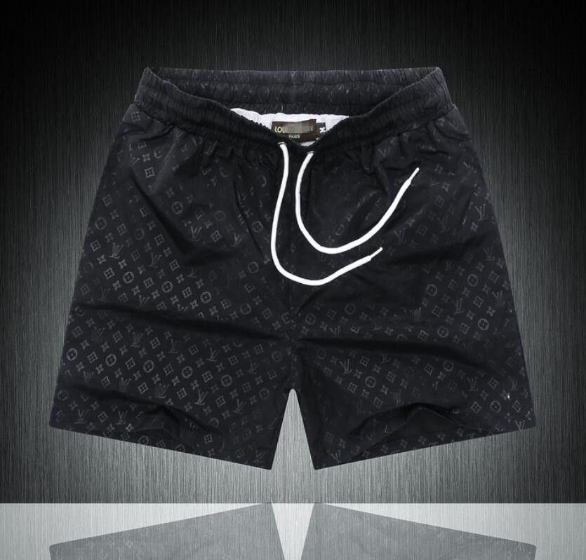 Diseñador de pantalones de playa lujo para hombre Pantalones Casual placa Color Sólido