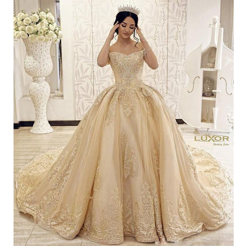 beaded lace wedding dress with pleated skirt