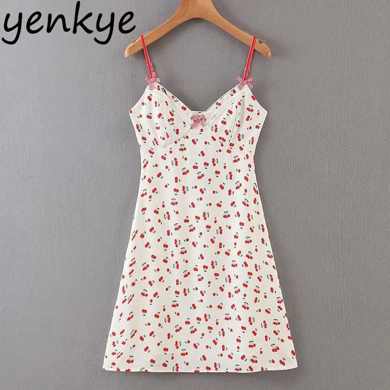 white dress with cherry print