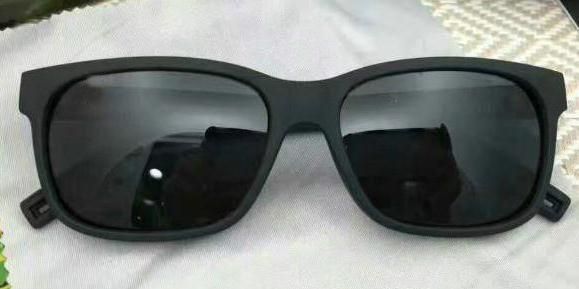 black frame grey lens