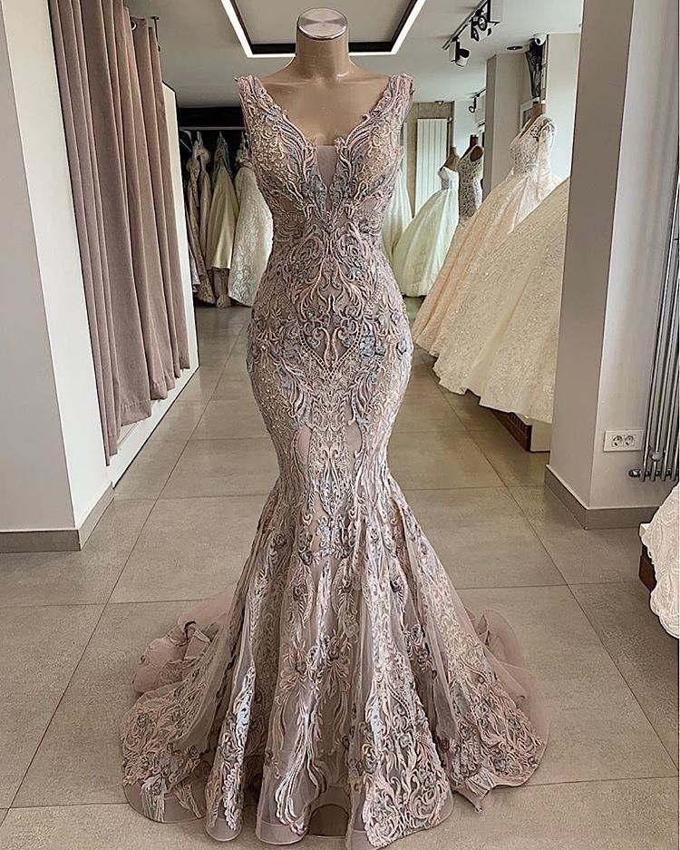 2019 Lace Beaded Sexy African Dubai Evening Dresses Deep V Neck Mermaid