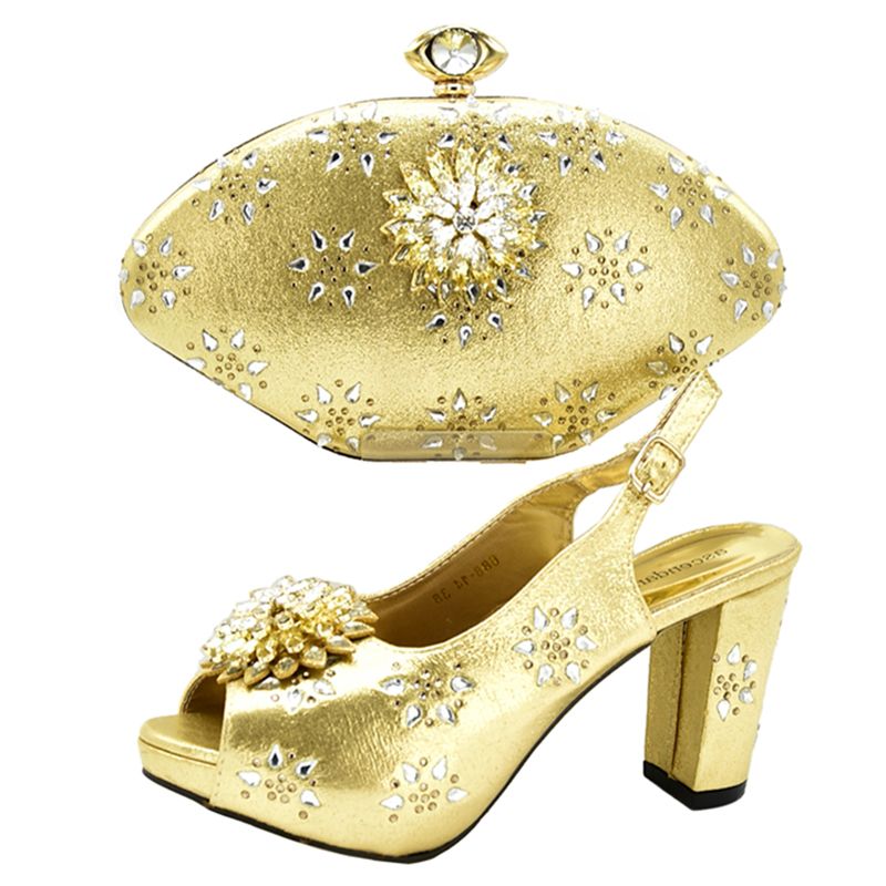 gold heels and bag