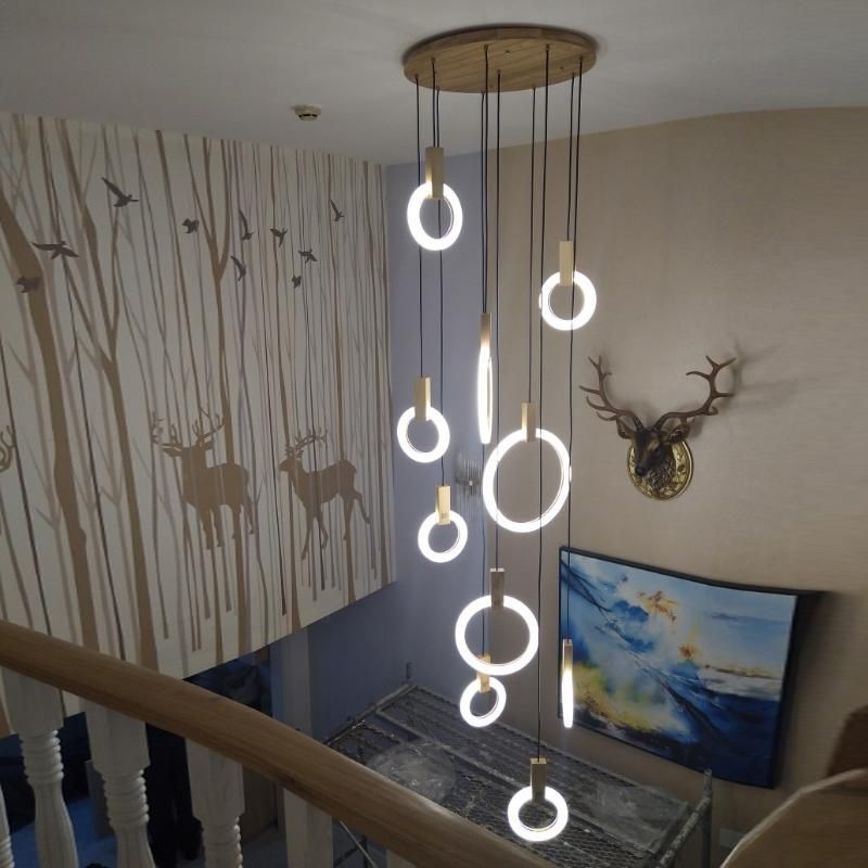 contemporary long drop stairwell lighting