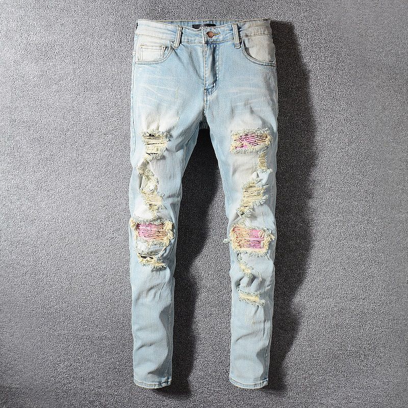 Compra Los Agujeros Nuevos Vaqueros Para Hombre Azul Del Hombre De La  Cremallera De La Decoración Jeans Pantalones Casual Slim Fit Ropa De Moda  De Hip Hop De Los Hombres De Los