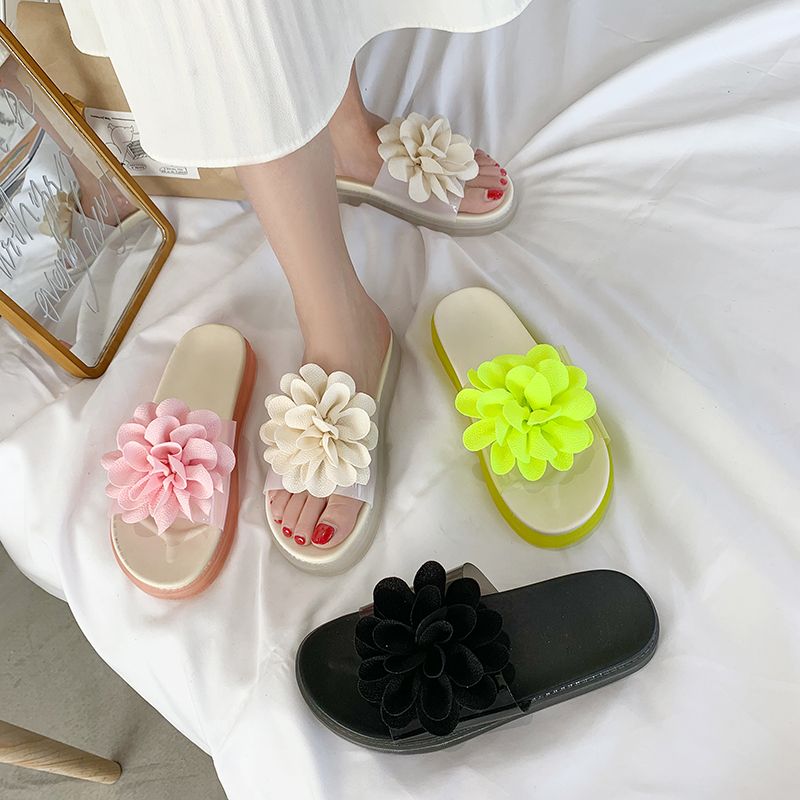 flip flops with big flowers on top