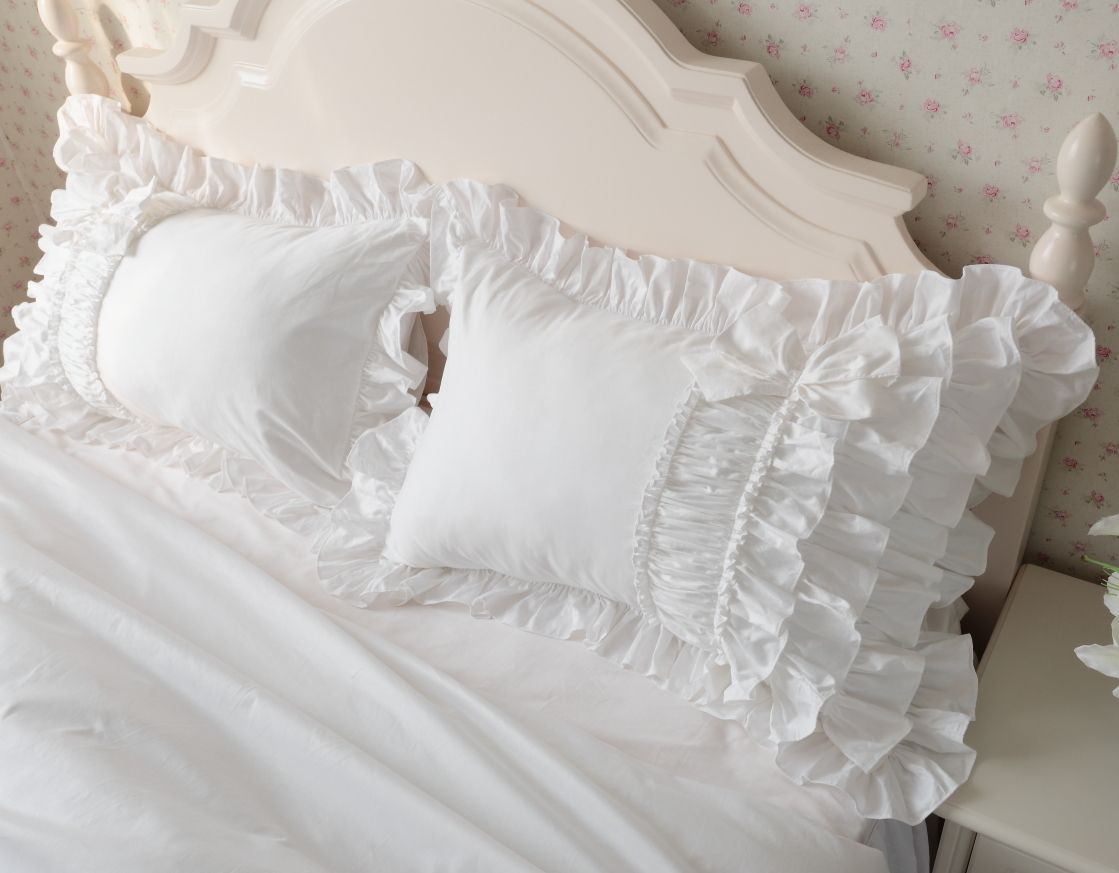 white ruffle pillow case
