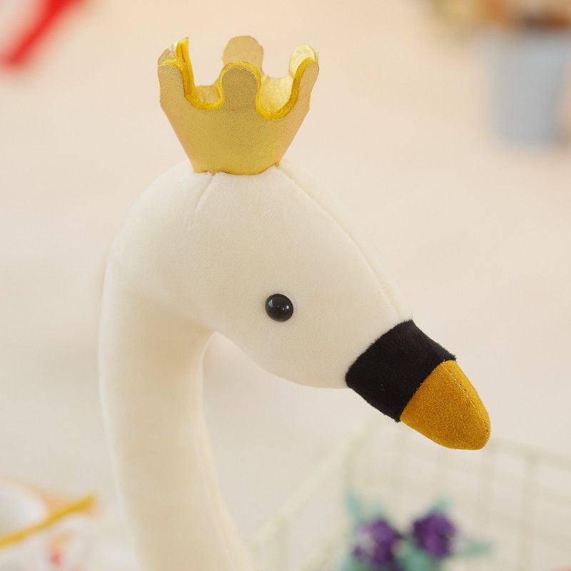 stuffed swan with crown
