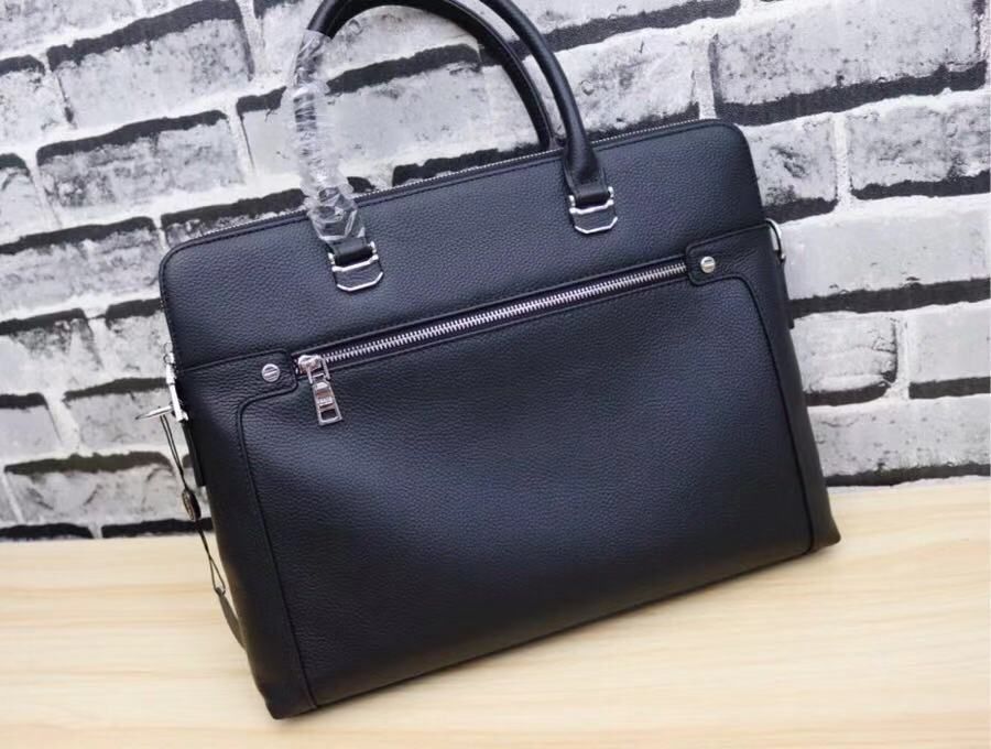 man carrying briefcase