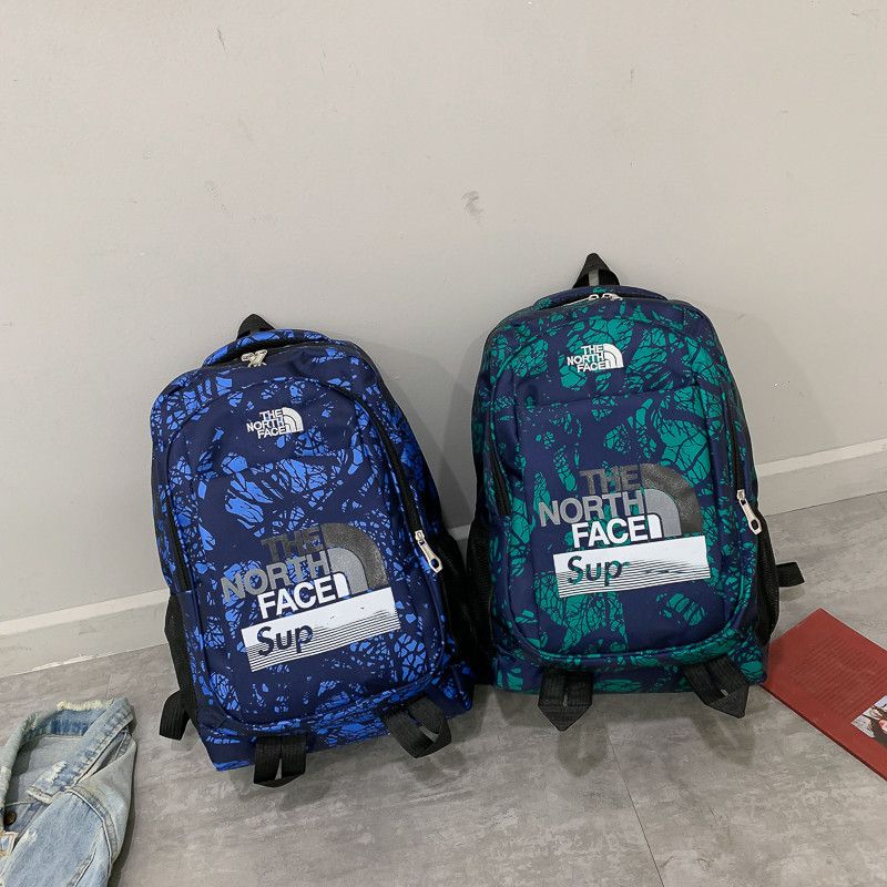 Compra Supre Luxury Mochila De Diseño Sup The North Joint Face Camo Bolso  De Hombro Marca Boy Girl Mochilas Escolares Mochila Para Portátil Mochila  De Viaje B80701 Barato | Entrega Rápida Y
