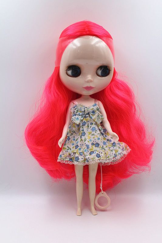 doll with red curly hair