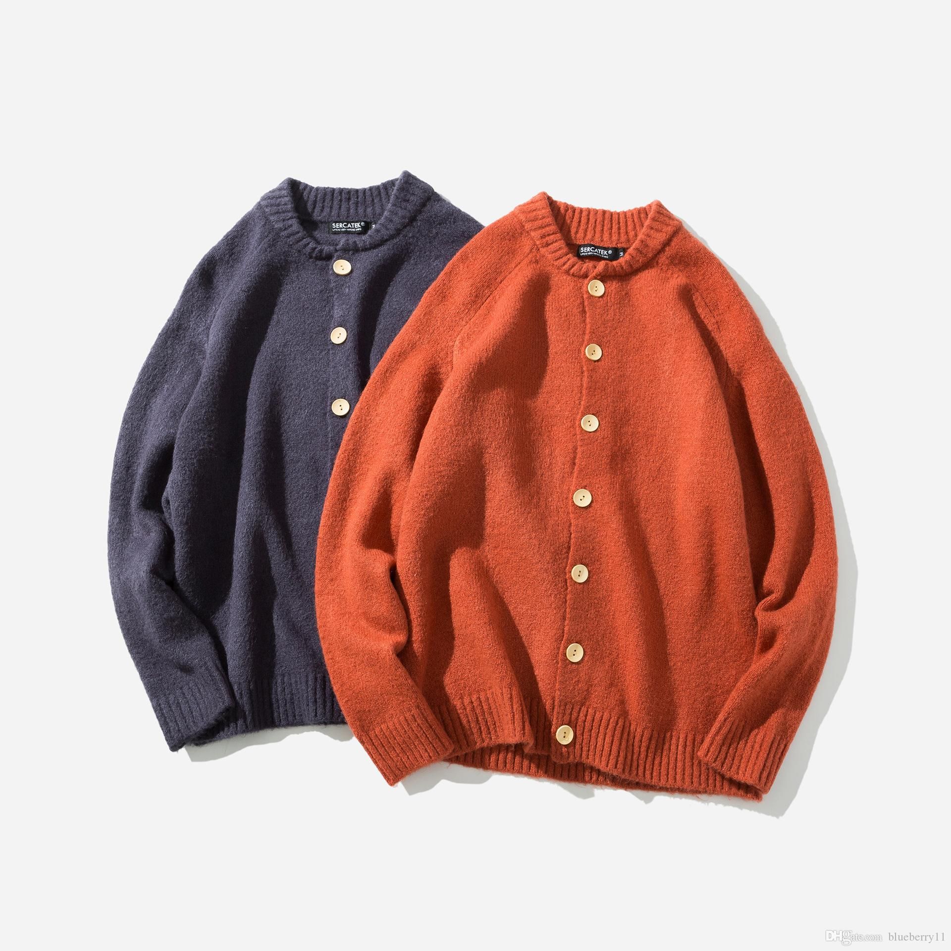orange and black cardigan
