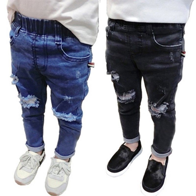 Nuevos pantalones vaqueros rotos para niños niñas Pantalones pitillo Pantalones vaqueros vaqueros de primavera