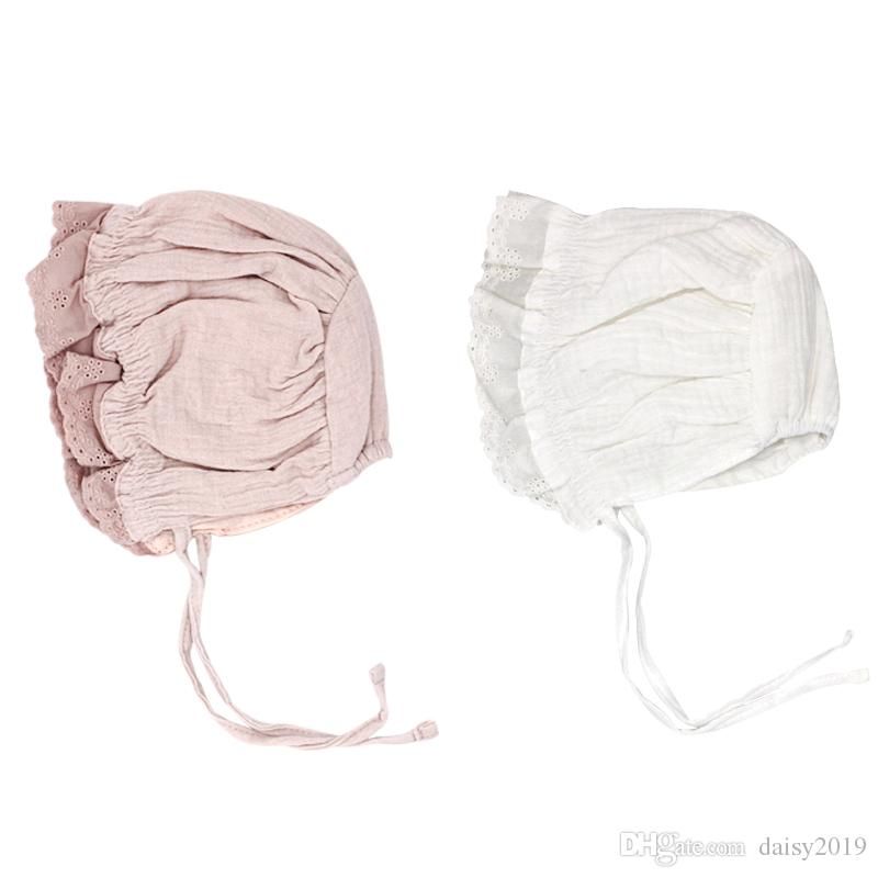 white cotton baby hat