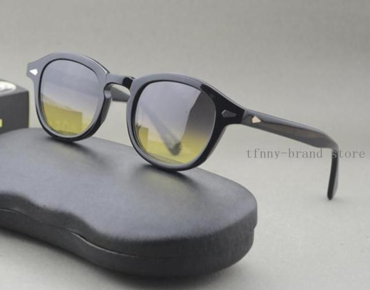 black frame grey yellow lens