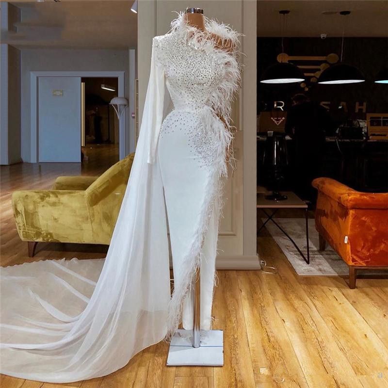 formal gown with feathers