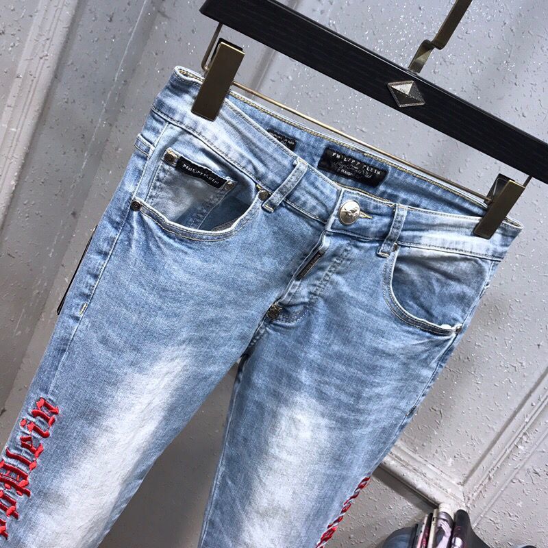 Nuevos tejanos con agujeros rasgados para hombre pantalones vaquero Nuevos tejanos con agujeros rasgados para hombre pantalones vaquero