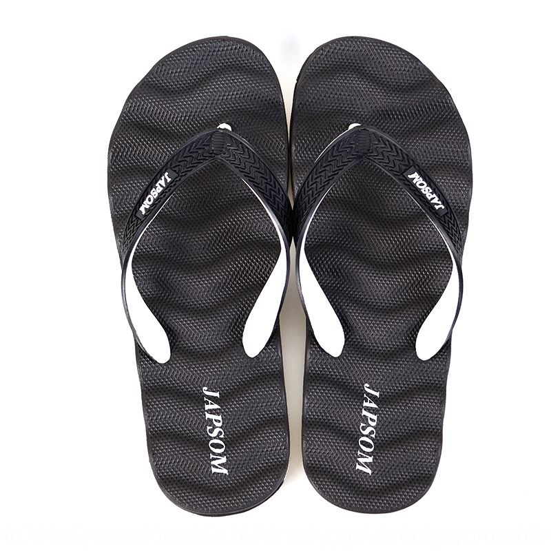 slippers on the beach