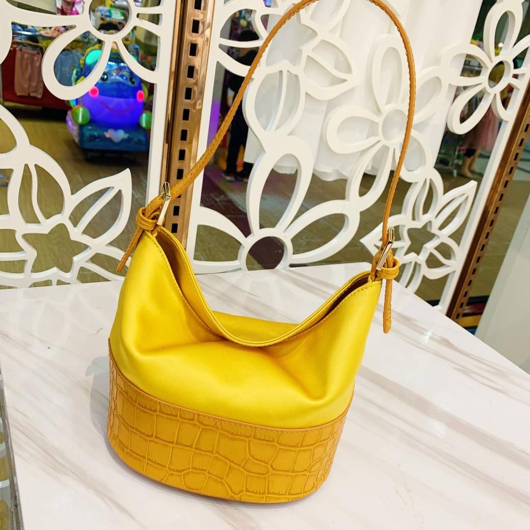 yellow croc purse