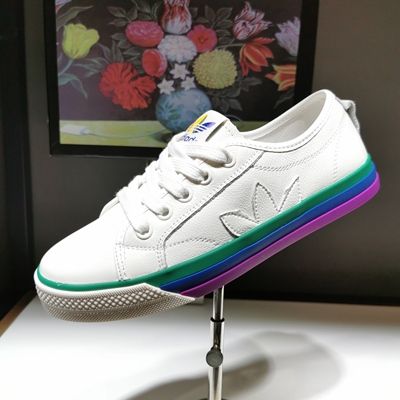 white shoes with rainbow soles