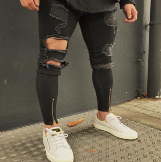 2019 Nuevos pantalones vaqueros rotos negros Hombres con agujeros Super Famosa marca de diseñador Slim