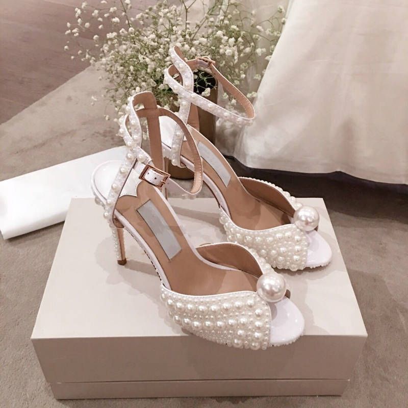 white pearl flat sandals