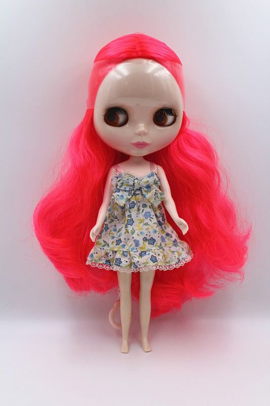 doll with red curly hair
