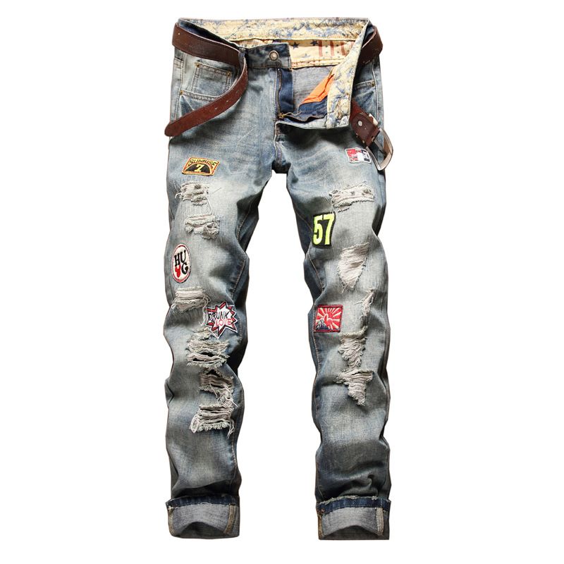 men's light colored ripped jeans