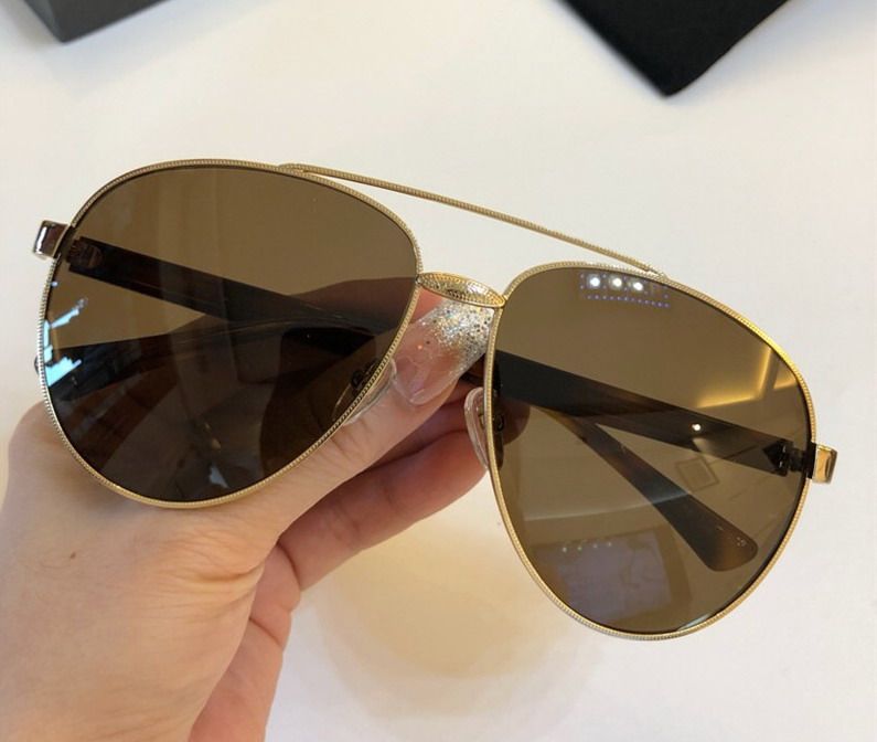 gafas de sol hombre doradas