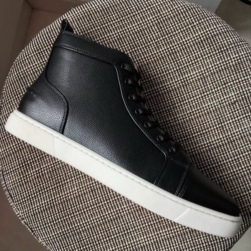 black high top shoes with white soles