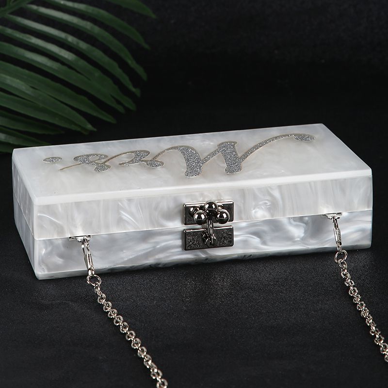 white acrylic clutch