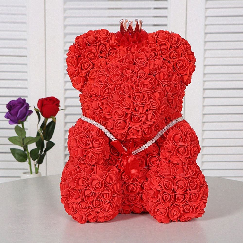 big teddy bear and flowers