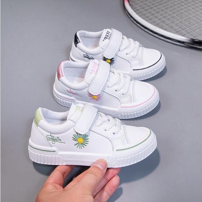 white canvas velcro shoes