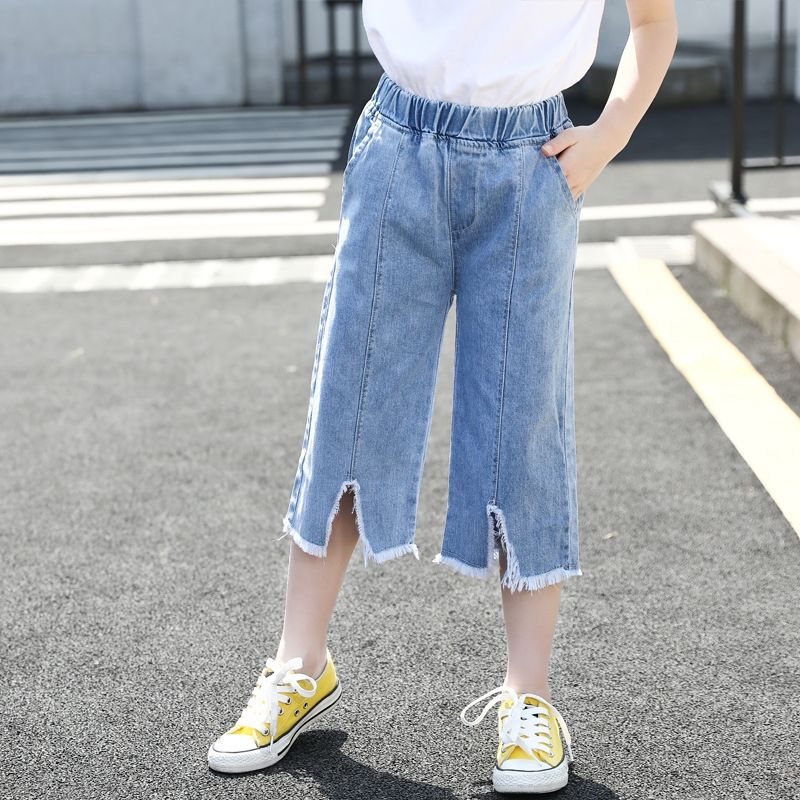 boy wearing girl jeans