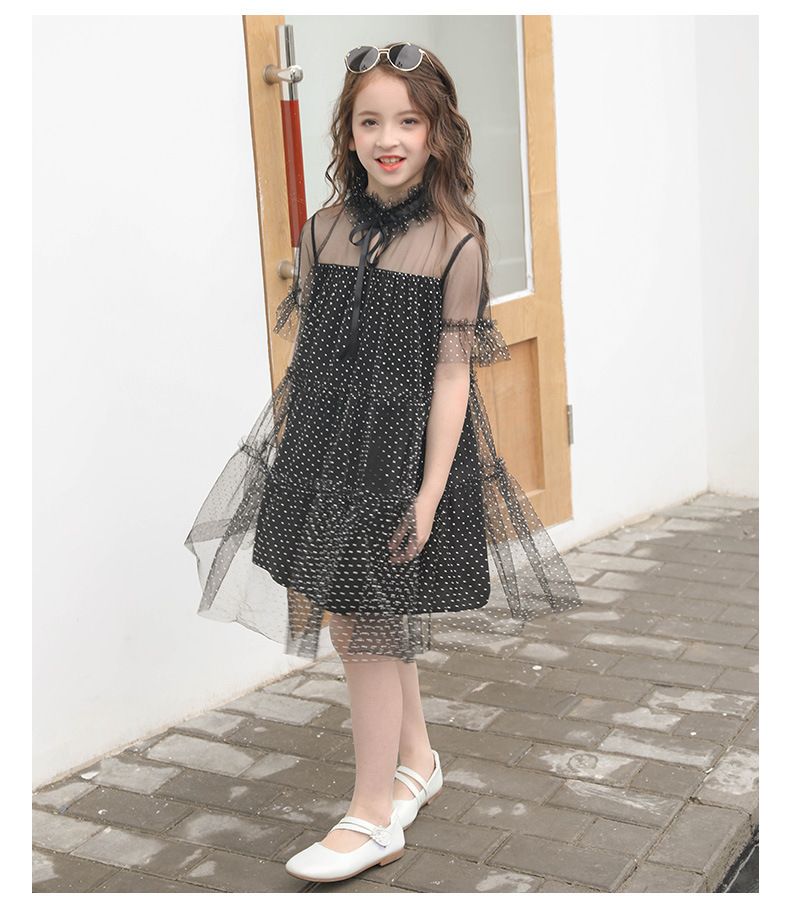 teenage girl black dress