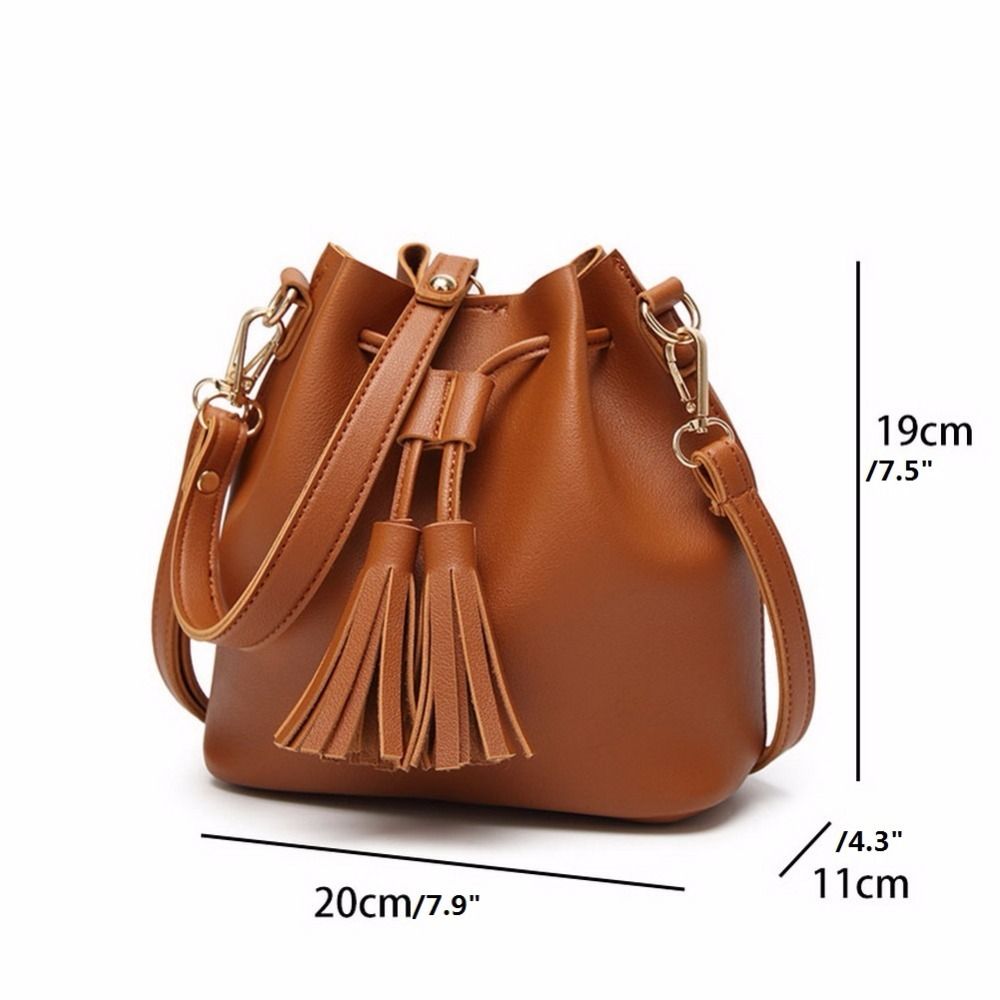 leather bucket bag with tassels