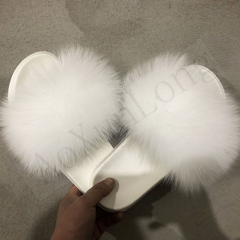 white slides with fur